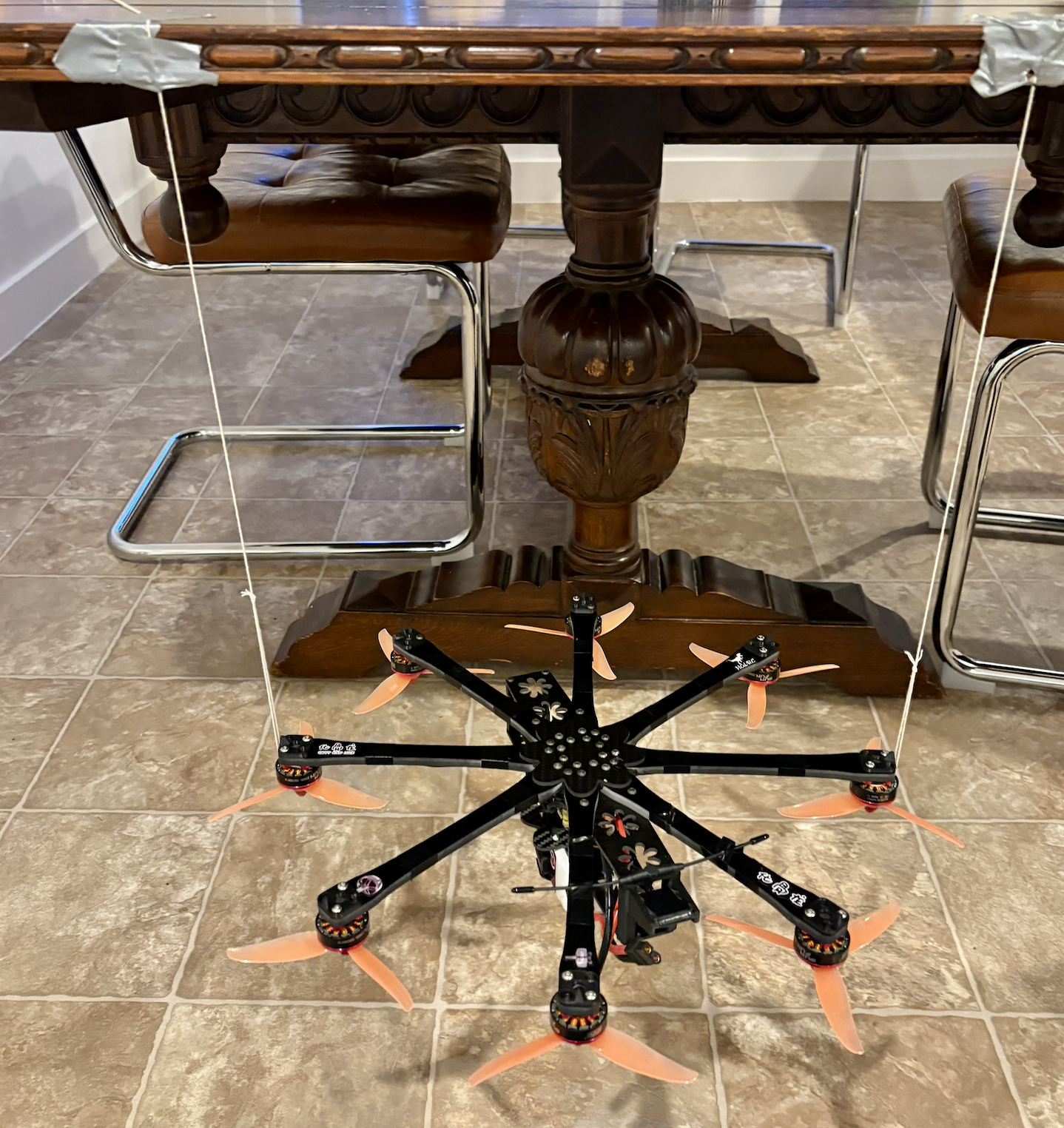 Yaw bifilar pendulum setup (I promise the strings are parallel and straight IRL)
