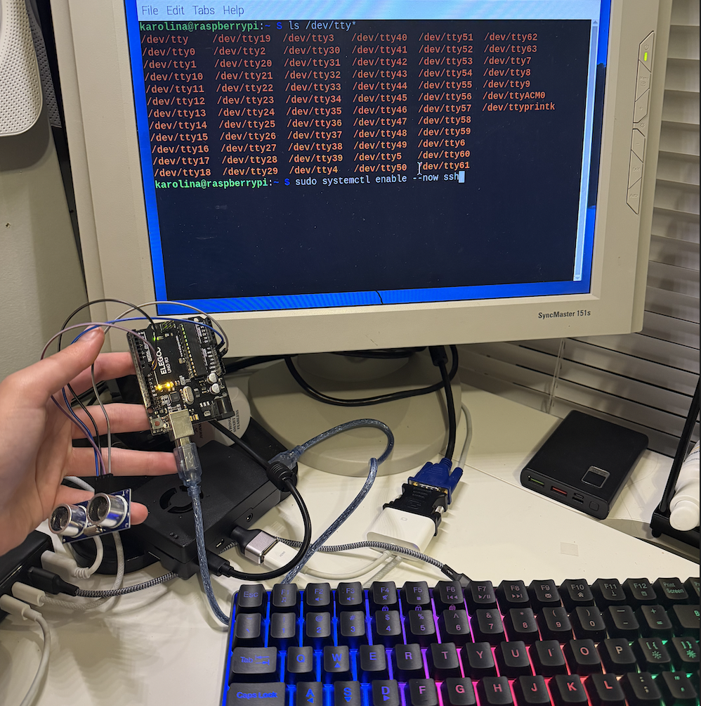HC-SR04 ultrasonic sensor wired to an Elegoo Uno on the bench