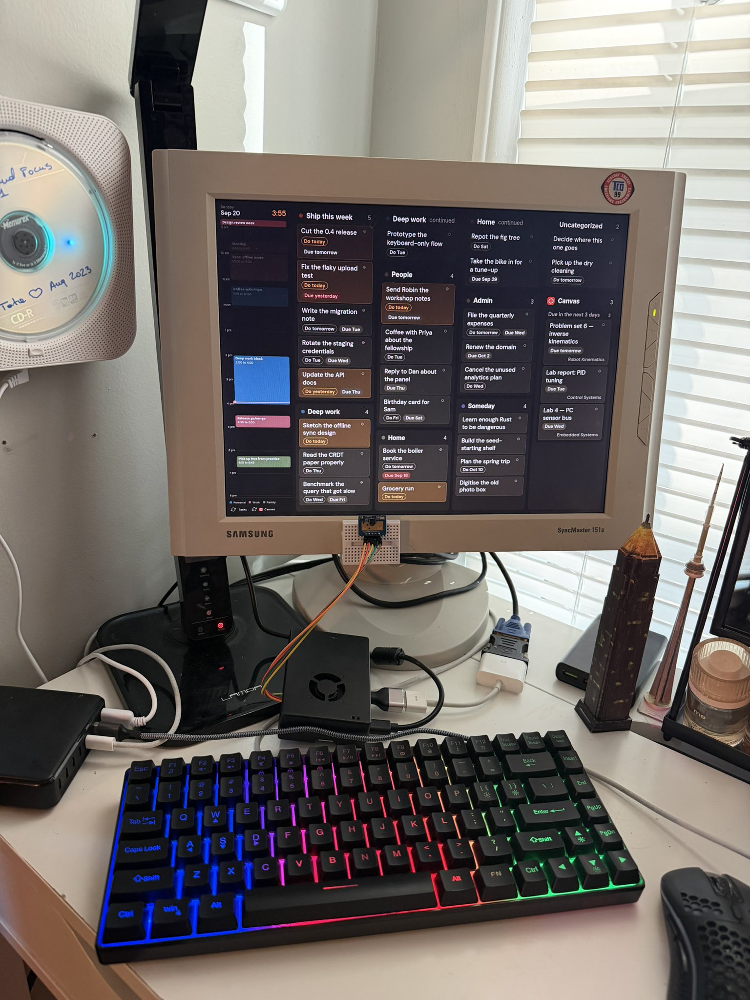Table's task board running on a 15-inch Samsung SyncMaster above a desk, with the mmWave radar breadboard taped to the bezel